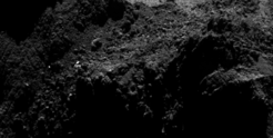 Zooming in towards the current CONSERT ellipse, a number of bright dots are seen in the region. As only one (at most) of these could be the lander, the majority must be associated with surface features on the comet nucleus.